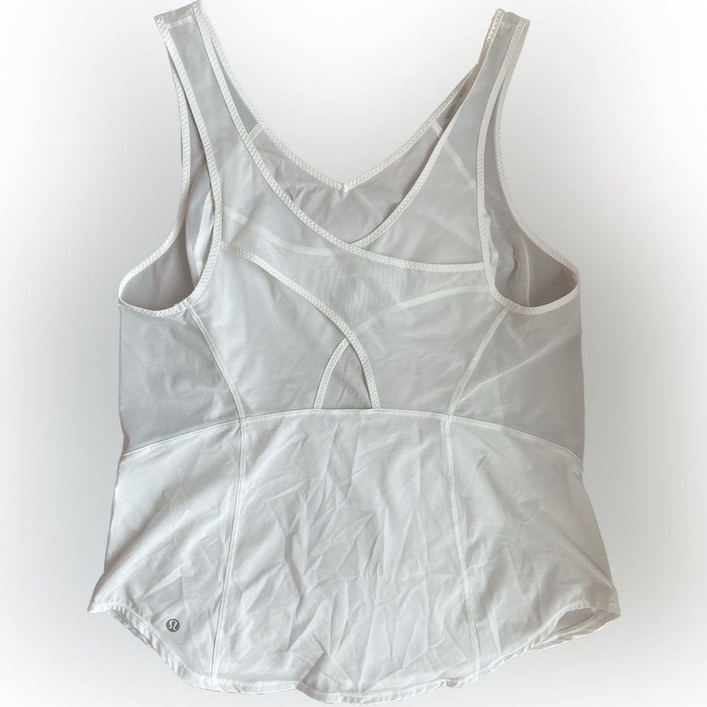 Lululemon Athletica - Run with the Sun Tank Top in white. Size 10